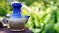 Close up the ceramic drink bottle on the table Royalty Free Stock Photo