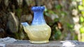 Close up the ceramic drink bottle on the table Royalty Free Stock Photo