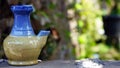 Close up the ceramic drink bottle on the table Royalty Free Stock Photo