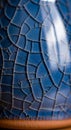 Close-up of a ceramic surface with a blue crackle glaze pattern resembling fish Royalty Free Stock Photo