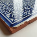 Close-up of a ceramic tile featuring a geometric pattern in deep blue Royalty Free Stock Photo