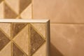 Close-up of ceramic tiles out corner with silver metal strip on the interior wall. Royalty Free Stock Photo
