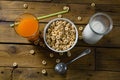 Cereal rings, orange juice and milk on wooden table Royalty Free Stock Photo