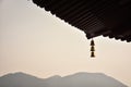 The close-up of a chain of bells under the eaves of the Chinese buddhist temple. Royalty Free Stock Photo