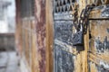 Close up of a chain is hooking on old classic chinese style door with a lock Royalty Free Stock Photo