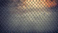 Close-up of a Chain Link Fence with a Blurred Background Royalty Free Stock Photo