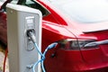 Close up of charging station with electric car Royalty Free Stock Photo