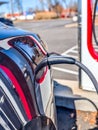 Close up of charging station with electric car Royalty Free Stock Photo