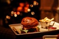 Close Up Cheese Burger And French Fries in garland background. Royalty Free Stock Photo