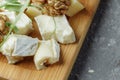 Close-up of a cheese plate. 4 types of cheese, soft white brie cheese, camembert, semi-soft briques, blue, roquefort, hard cheese Royalty Free Stock Photo