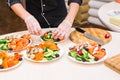 Close-up of chef cooking food kitchen restaurant cutting cook hands hotel man male knife preparation fresh preparing Royalty Free Stock Photo