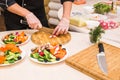 Close-up of chef cooking food kitchen restaurant cutting cook hands hotel man male knife preparation fresh preparing Royalty Free Stock Photo