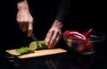 Close up of chef mans hands chopping vegetables Royalty Free Stock Photo