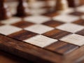 A close up of a chess board with pieces on it Royalty Free Stock Photo