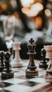 A close up of a chessboard featuring an elevated king piece symbolizing strategy and triumph Royalty Free Stock Photo