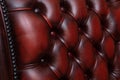 Close up of Chesterfield Chair in oxblood leather