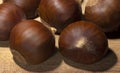 Close up of chestnuts on butcher block