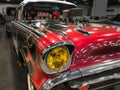 Close-up of a Chevrolet Bel Air interpretation with custom painted flames, at Detroit Autorama
