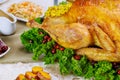 Close up of chicken, decorated with kale and cranberry for Christmas dinner Royalty Free Stock Photo