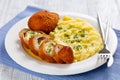 Chicken Kiev served with potato mash on a plate Royalty Free Stock Photo