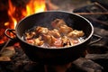 close-up of chicken marinating in a bowl near fire Royalty Free Stock Photo
