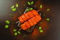 Food concept.Chicken breast Fillets.Fresh raw marinated chicken fillet skewers with fresh herbs on a black background Royalty Free Stock Photo