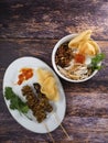 A close up of chicken porridge in a porridge bowl