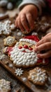 Close Up of Child Decorating Santa Sugar Cookie Royalty Free Stock Photo