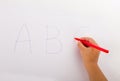 Child hand writing ABC Royalty Free Stock Photo