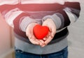 Close up of child hands holding red heart. Cardiology concept Royalty Free Stock Photo