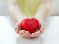 Close up of child hands holding red heart Royalty Free Stock Photo