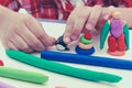 Close up child's hand moulding modeling clay. Strengthen the ima Royalty Free Stock Photo