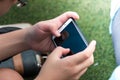 Close up of a child using mobile smart phone