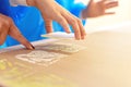 Close-up of a children in art therapy class drawing, painting and practicing engraving art. Child education in primary school at