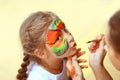 Children`s makeup artist, does animation make-up on little girls