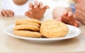 Close-up of children taking biscuits Royalty Free Stock Photo