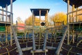 Close up of children's playground wooden play structure fort with climbing ropes, ladder and bridge. Royalty Free Stock Photo