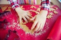 Close up of childs hands making christmas cookies Royalty Free Stock Photo