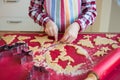 Close up of childs hands making christmas ginger cookies  of different forms in kitchen Royalty Free Stock Photo