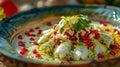 Close-up Chiles en Nogada - a traditional Mexican dish from Puebla, with poblano peppers stuffed with picadillo, topped with