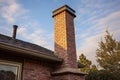 close-up of chimney on a brick facade ranch