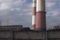 Close-up of chimneys and buildings by coal mine in Katowice. Industrial landscape. Global warming, CO2 emission, coal energy issue