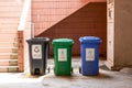 A close-up of Chinaâs community garbage sorting bins, translation: other garbage, kitchen waste, recyclables