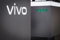 Close-up on the chinese brand VIVO and OPPO logo on a decorative wall in store