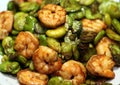 Close-up of the Chinese Cuisine - Fried Shrimp with Peas.