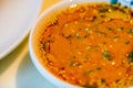 Close-up of Chinese eating hot pot with dipping sauce, sesame sauce