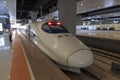 Close up of a Chinese fast train inside the newly opened high speed train station in Kunming. The new fast train station links Ku Royalty Free Stock Photo