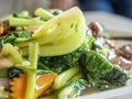 Close-up of Chinese stir-fry vegetables, such as broccoli, mushrooms and carrots Royalty Free Stock Photo