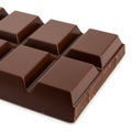 A close-up of a chocolate bar divided into rectangular segments with smooth surfaces