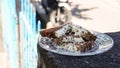 Close up of chocolate cake with cheese topping on a plate Royalty Free Stock Photo